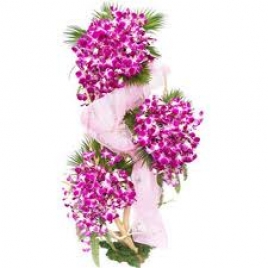 Exotic 3 Tier Arrangement Of Exotic Orchids